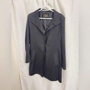 PTP 23. 35 inches in length. This jacket has some nice printing